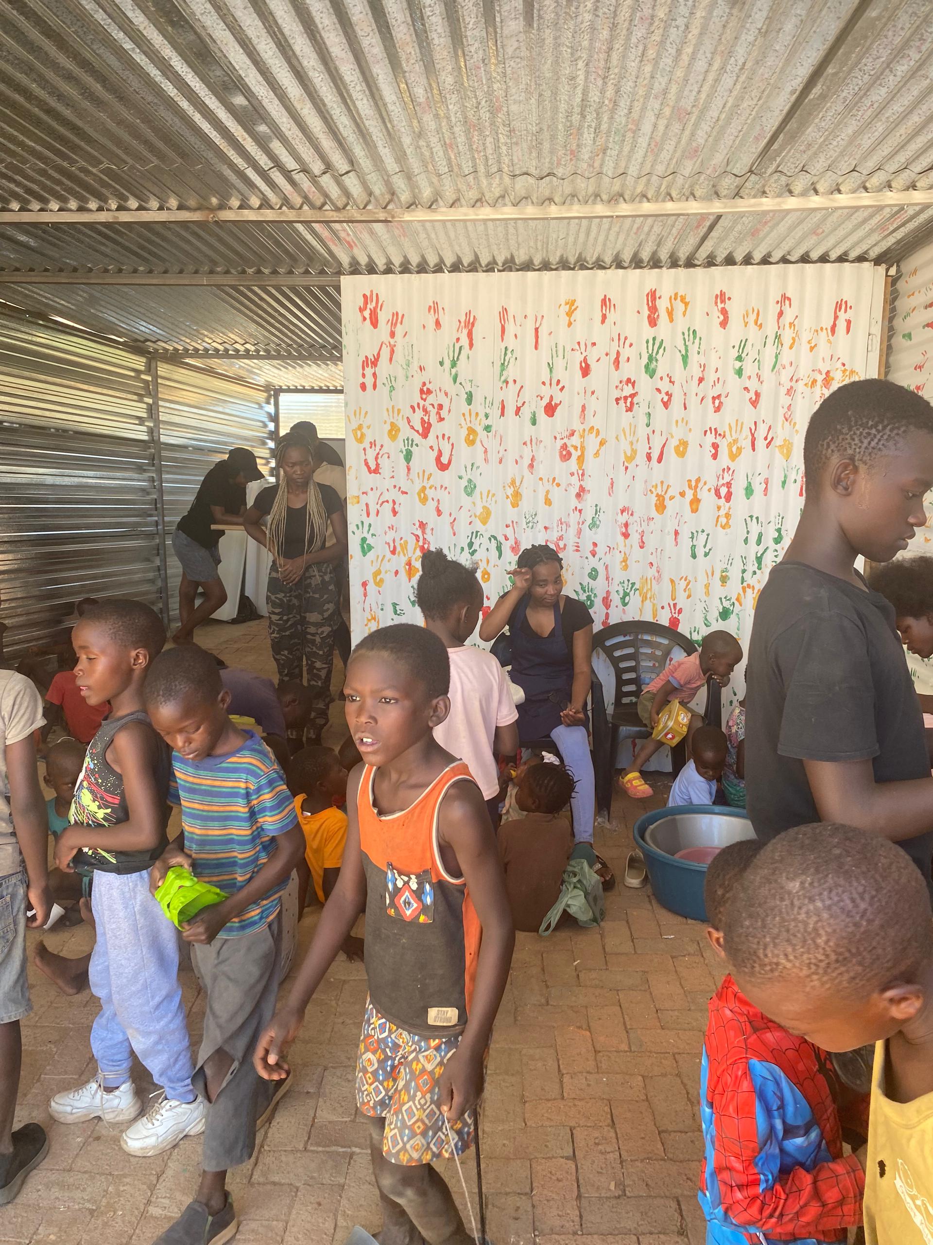 Community outreach activity with children and volunteers