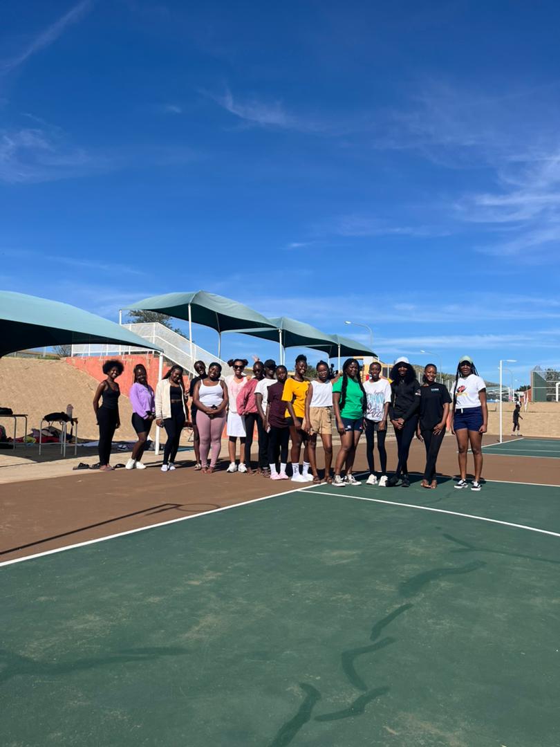 Group photo on an outdoor court