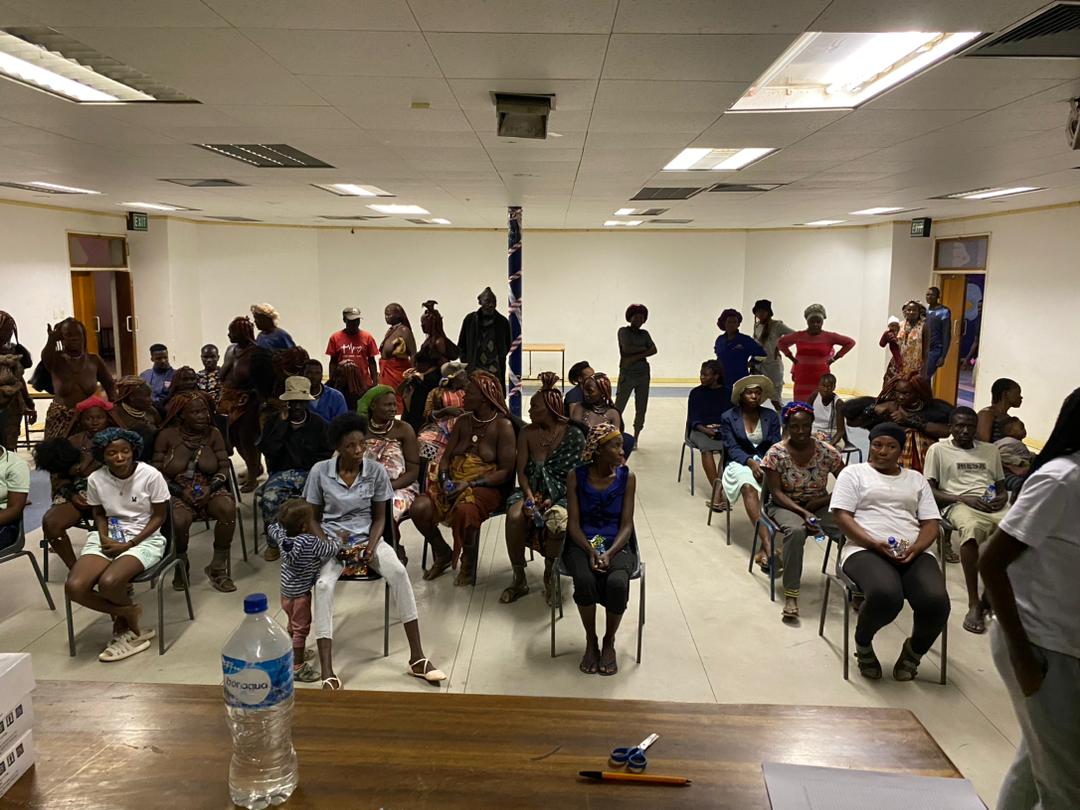 Community members seated during a learning session